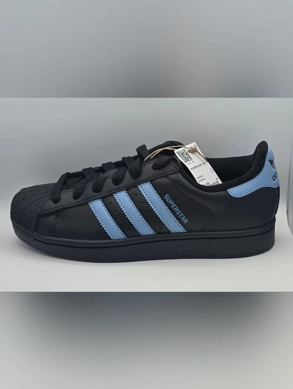 Adidas Superstar Black Sneaker with Light Blue Stripes